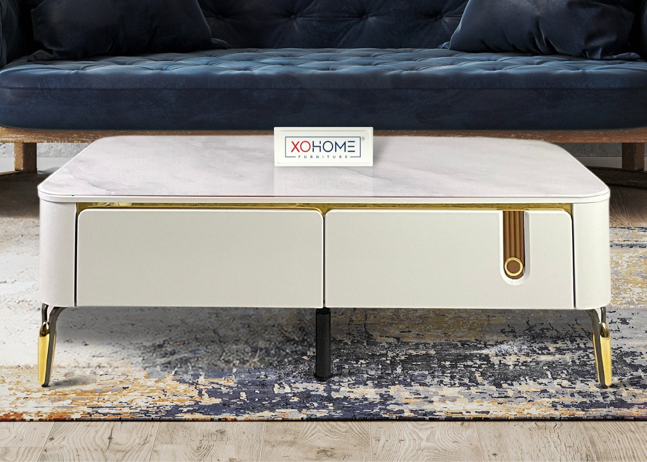 XOHOME Vail Glass top coffee table with 4 storage drawers. The glass top completely looks like a marble. 