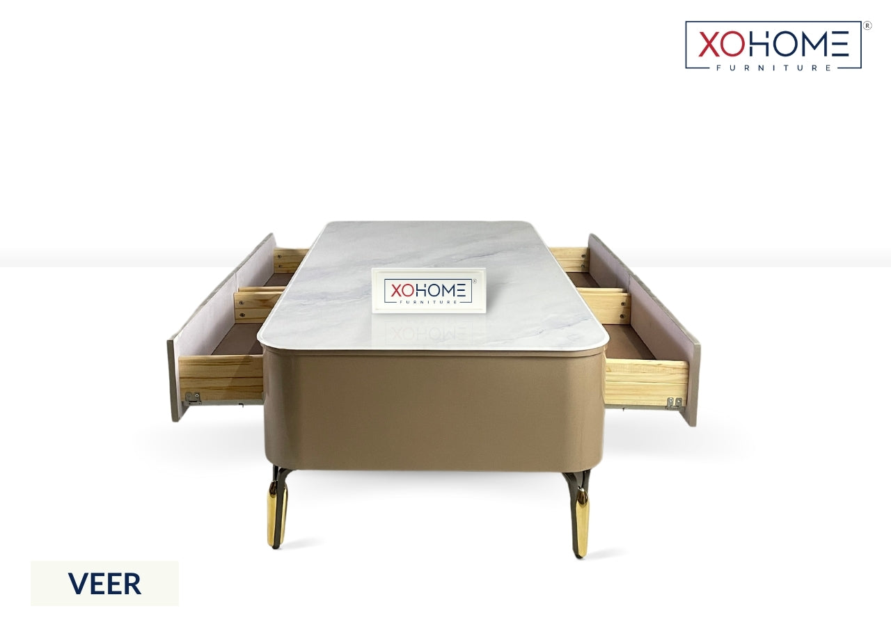 XOHOME Veer Glass top coffee table with 4 storage drawers. The glass top completely looks like a marble. 